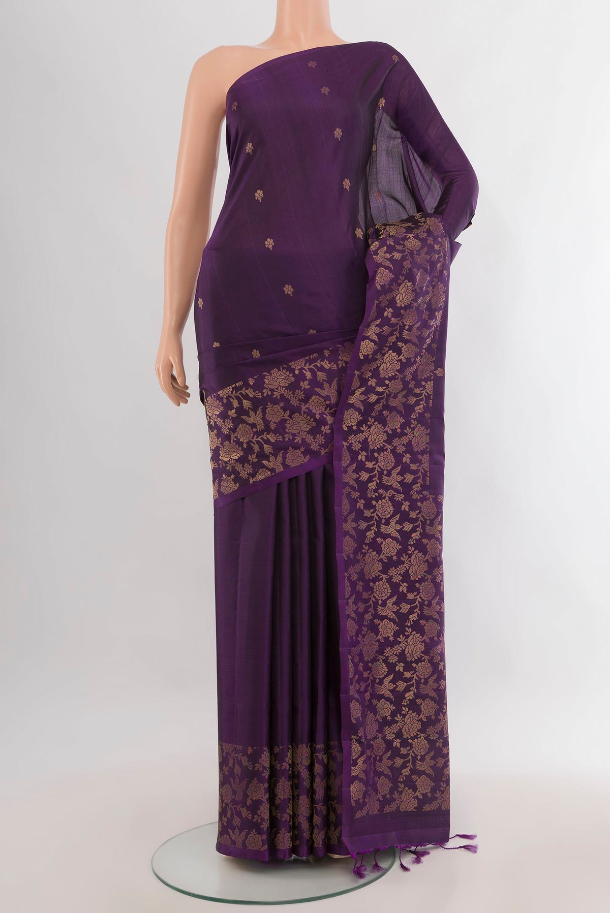 Pure Silk Violet Soft Saree with Zari Butta on the body and Fancy Border.  displayed on a mannequin