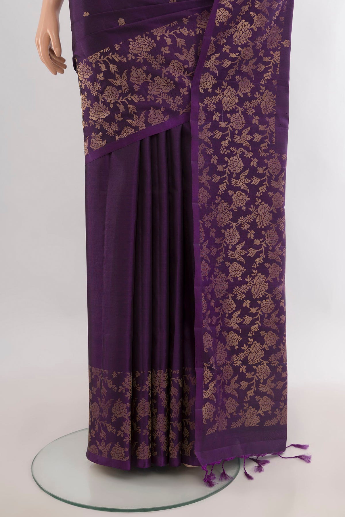 Pleats and pallu of Pure Silk Violet Soft Saree with Zari Butta on the body and Fancy Border. 