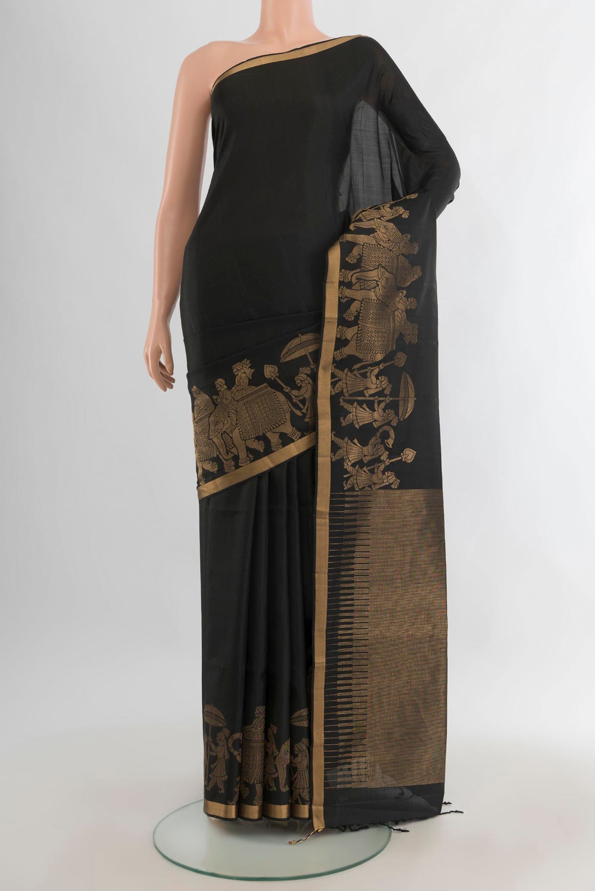 Pure Silk Black Soft Saree with Plain Body and Fancy Border.  displayed on a mannequin
