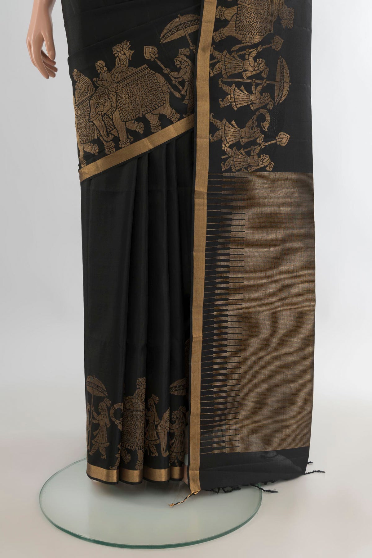 Pleats and pallu of Pure Silk Black Soft Saree with Plain Body and Fancy Border. 