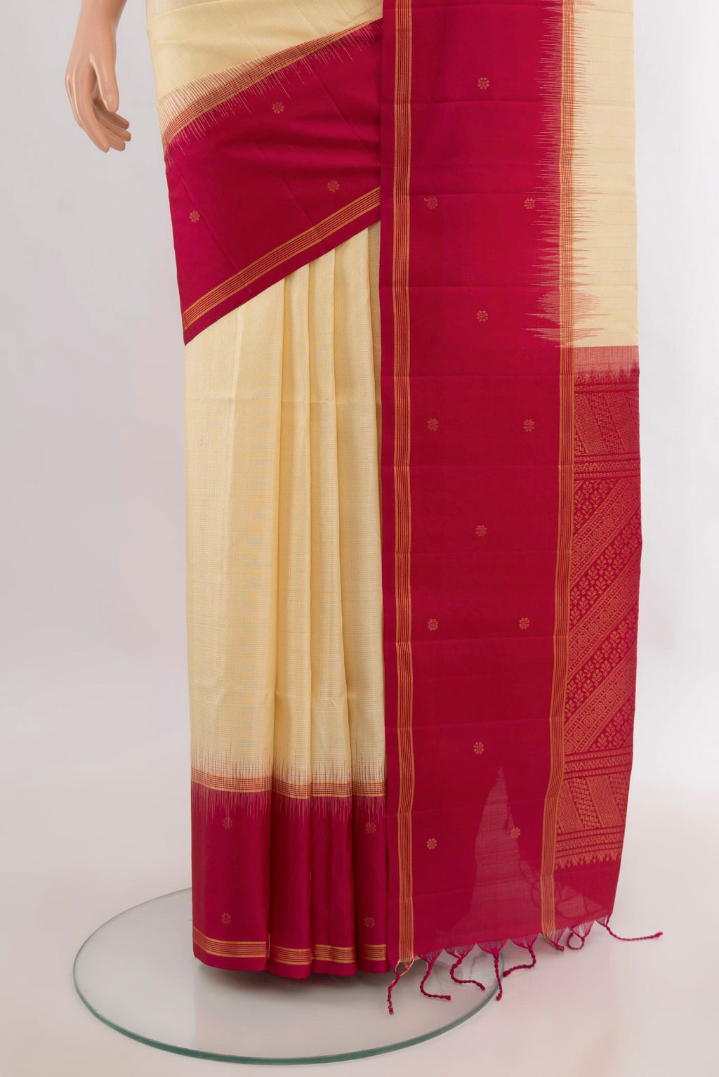 Pleats and pallu of Pure Silk Sandal Soft Saree with Zari Butta on the body and Plain Border. 