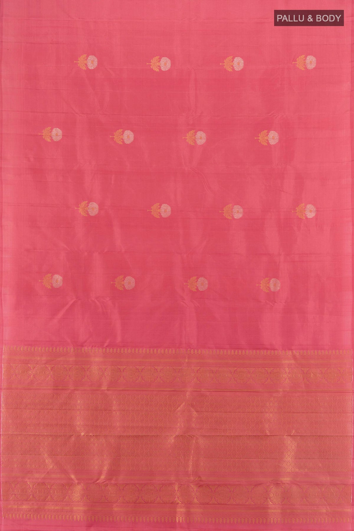 Flat view of Pure Silk Coral Soft Saree with Zari Butta on the body and Without Border. 