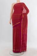 Pure Silk Red Kanjivaram Saree with Checked design on the body and Zari Border.  displayed on a mannequin