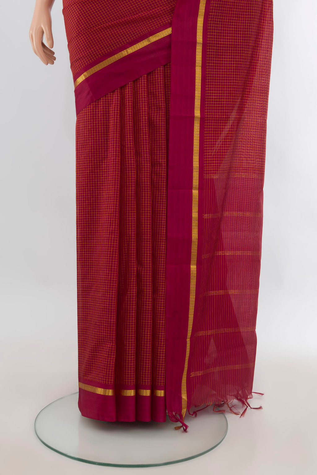 Pleats and pallu of Pure Silk Red Kanjivaram Saree with Checked design on the body and Zari Border. 