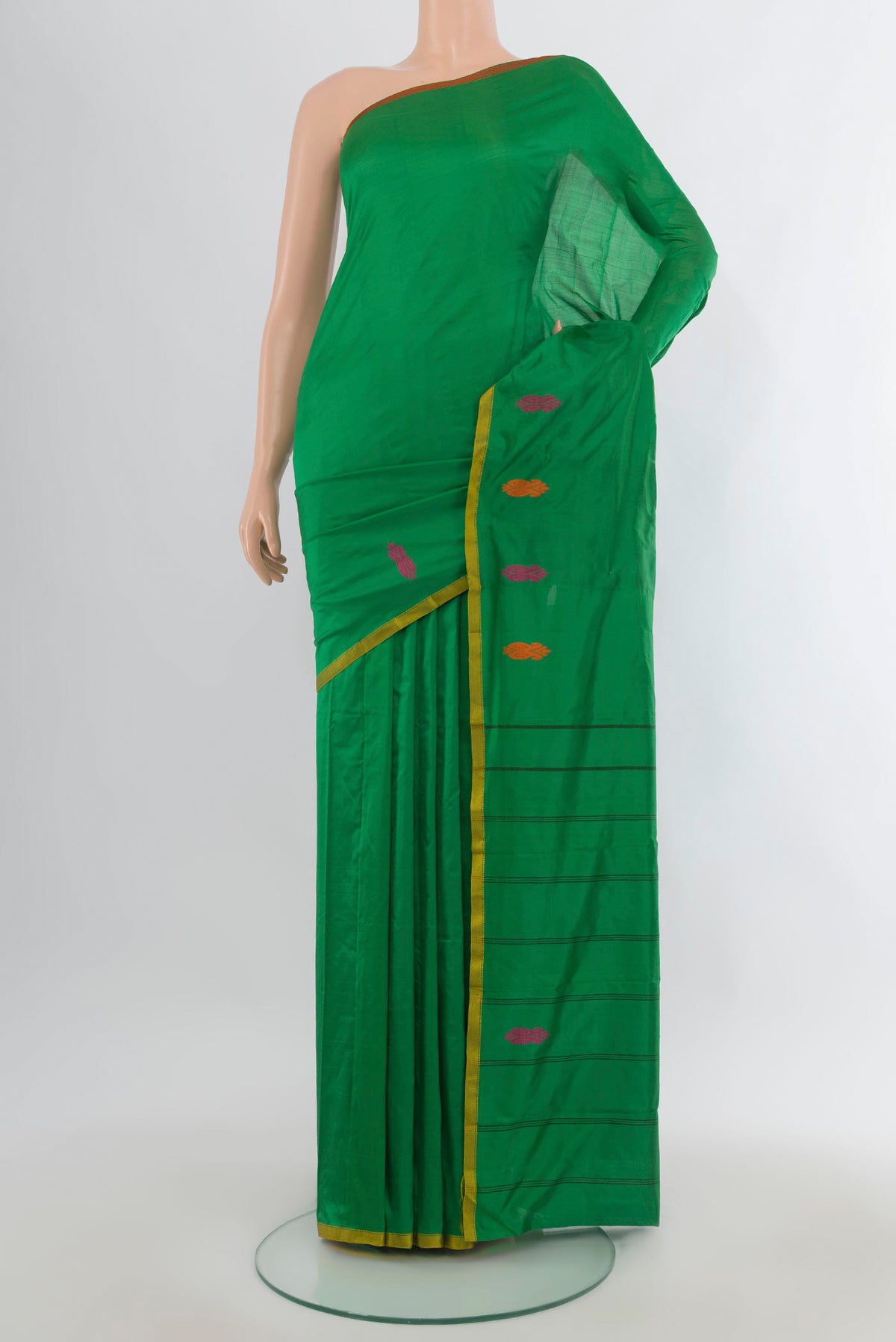 Pure Silk Green Kanchipuram Saree with Plain Body and Thread Border.  displayed on a mannequin