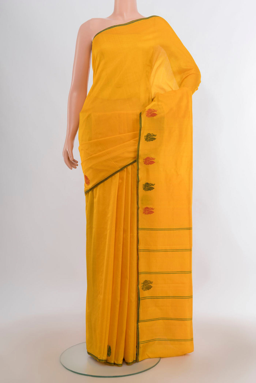 Pure Silk Yellow Kanchipuram Saree with Plain Body and Thread Border.  displayed on a mannequin