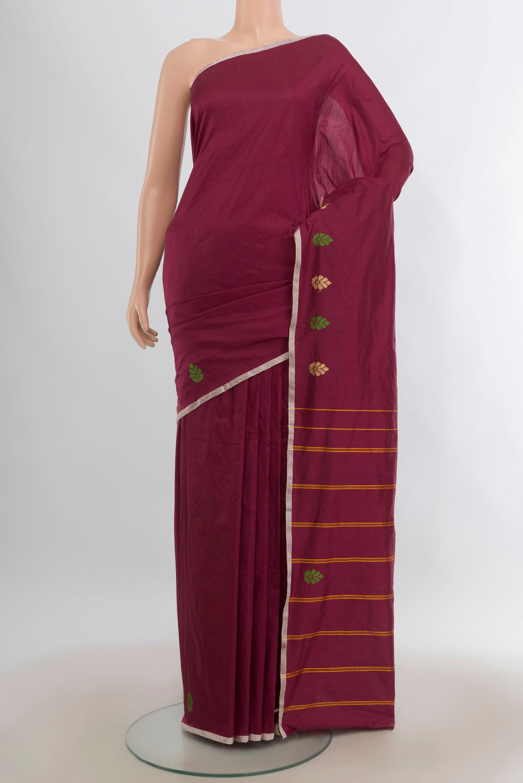 Pure Silk Maroon Kanchipuram Saree with Plain Body and Thread Border.  displayed on a mannequin