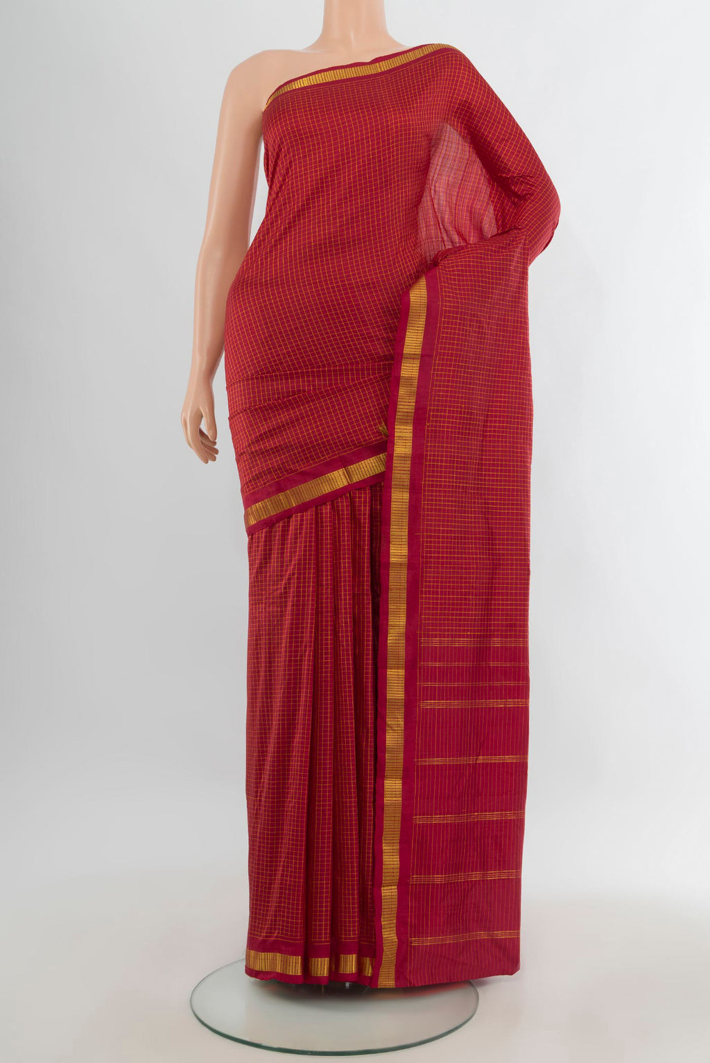 Pure Silk Red Kanjivaram Saree with Checked design on the body and Zari Border.  displayed on a mannequin