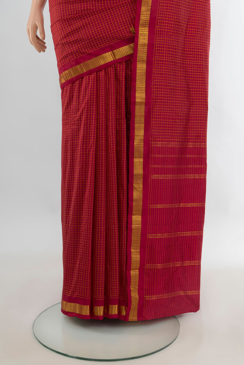 Pleats and pallu of Pure Silk Red Kanjivaram Saree with Checked design on the body and Zari Border. 