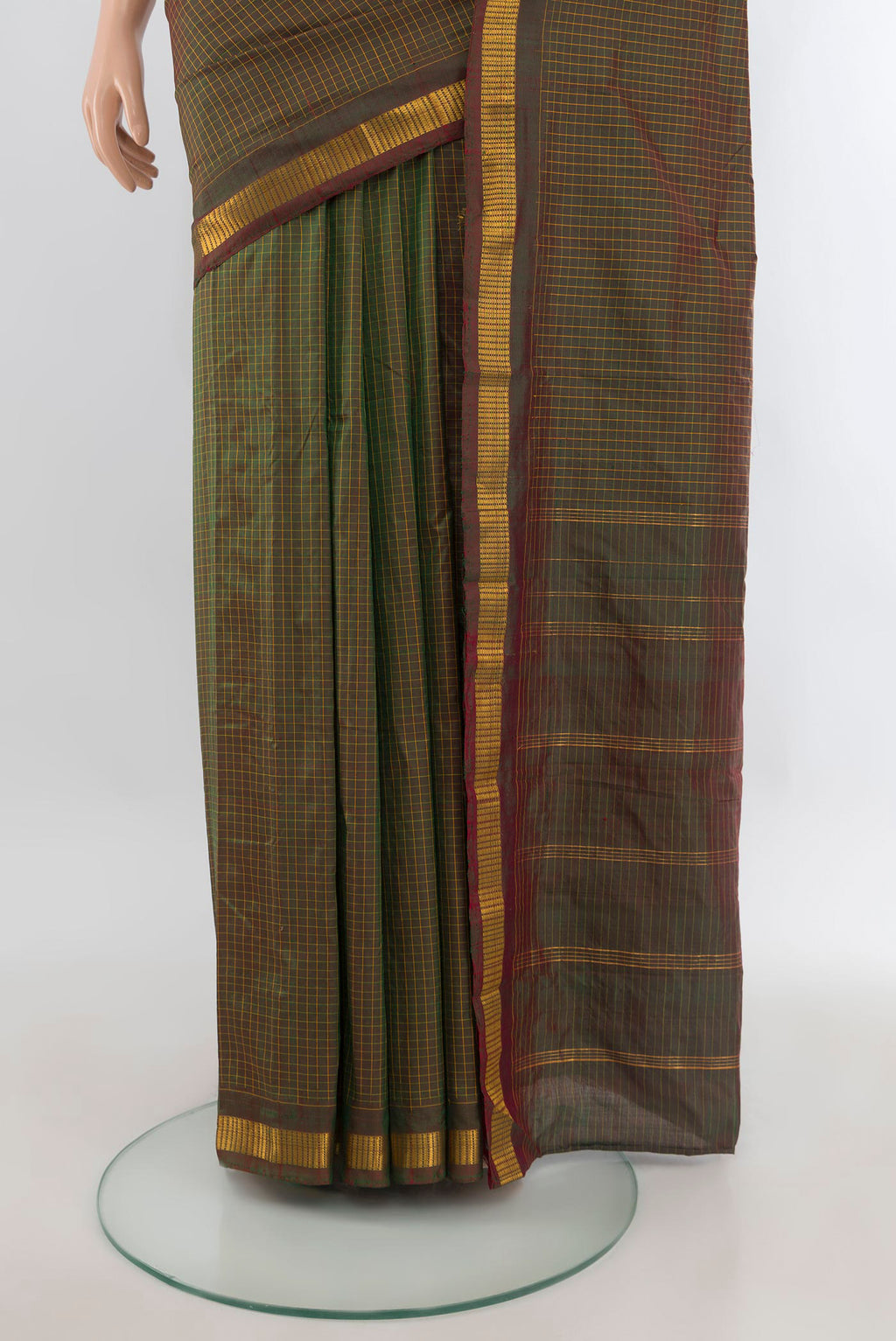 Pleats and pallu of Pure Silk Mehandi Green Dual Tone Kanjivaram Saree with Checked design on the body and Zari Border. 
