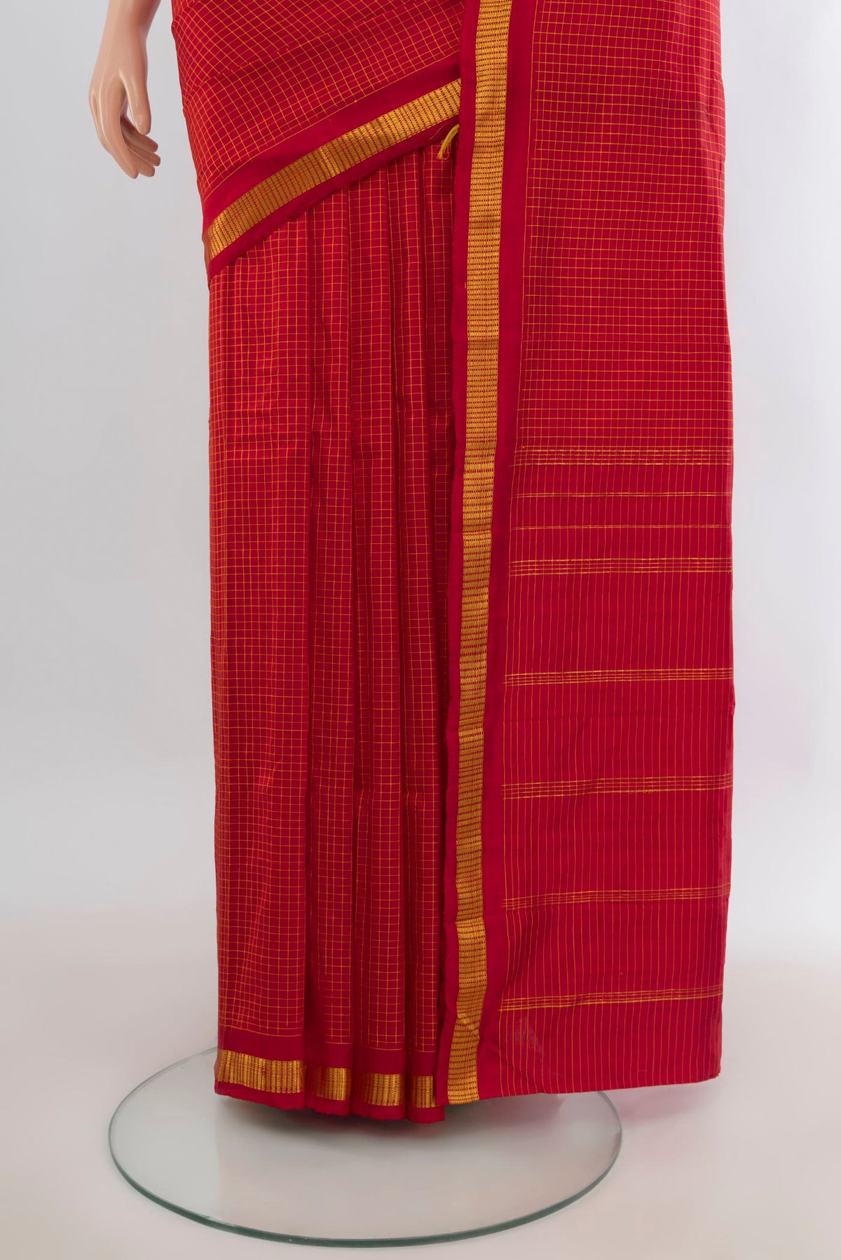 Pleats and pallu of Pure Silk Red Kanjivaram Saree with Checked design on the body and Zari Border. 
