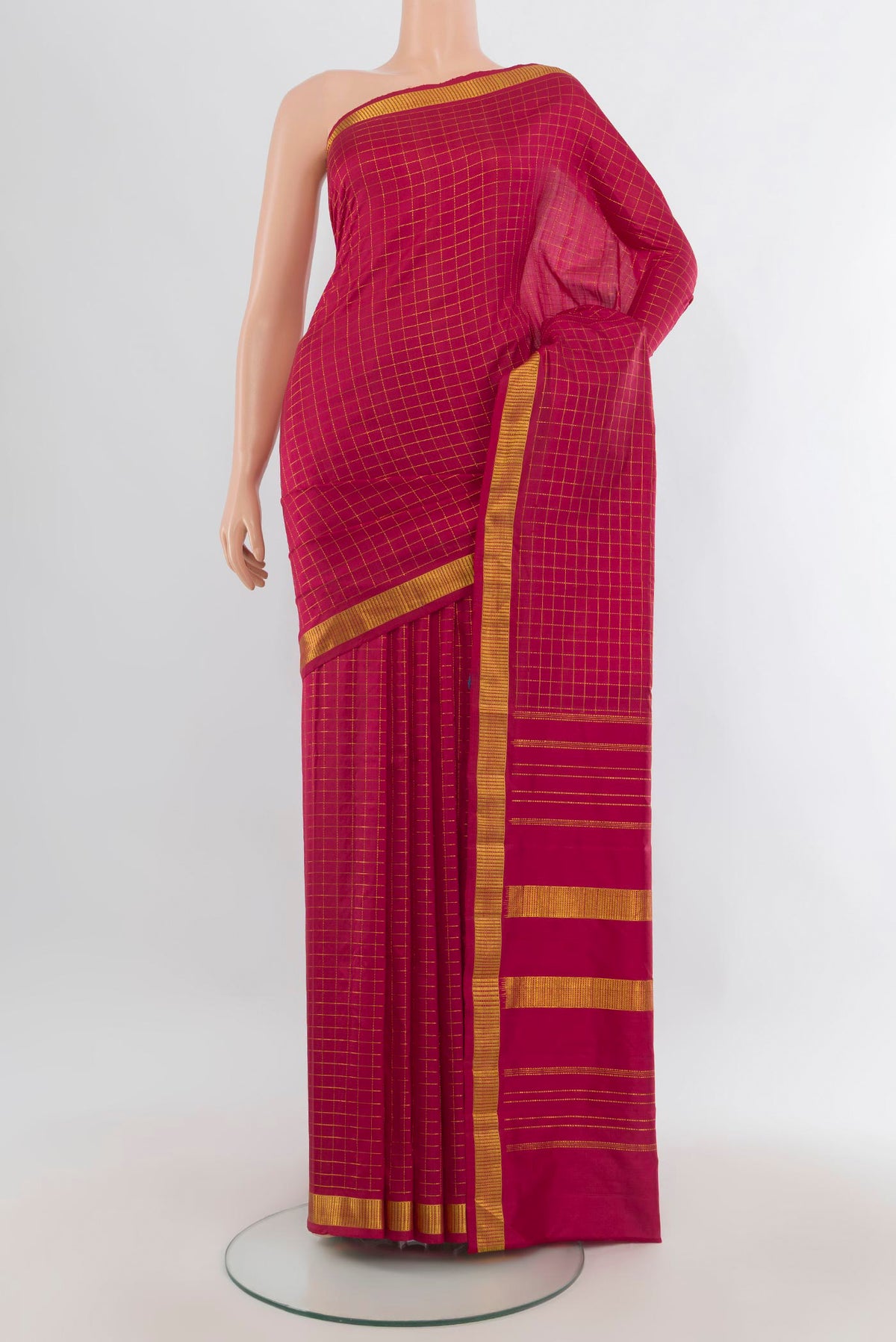 Pure Silk Maroon Kanchipuram Saree with Checked design on the body and Zari Border.  displayed on a mannequin