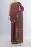 Pure Silk Green with Pink Color Kanchipuram Saree with Plain Body and Zari Border.  displayed on a mannequin