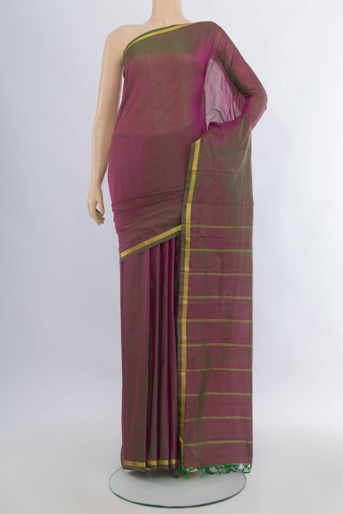 Pure Silk Green with Pink Color Kanchipuram Saree with Plain Body and Zari Border.  displayed on a mannequin