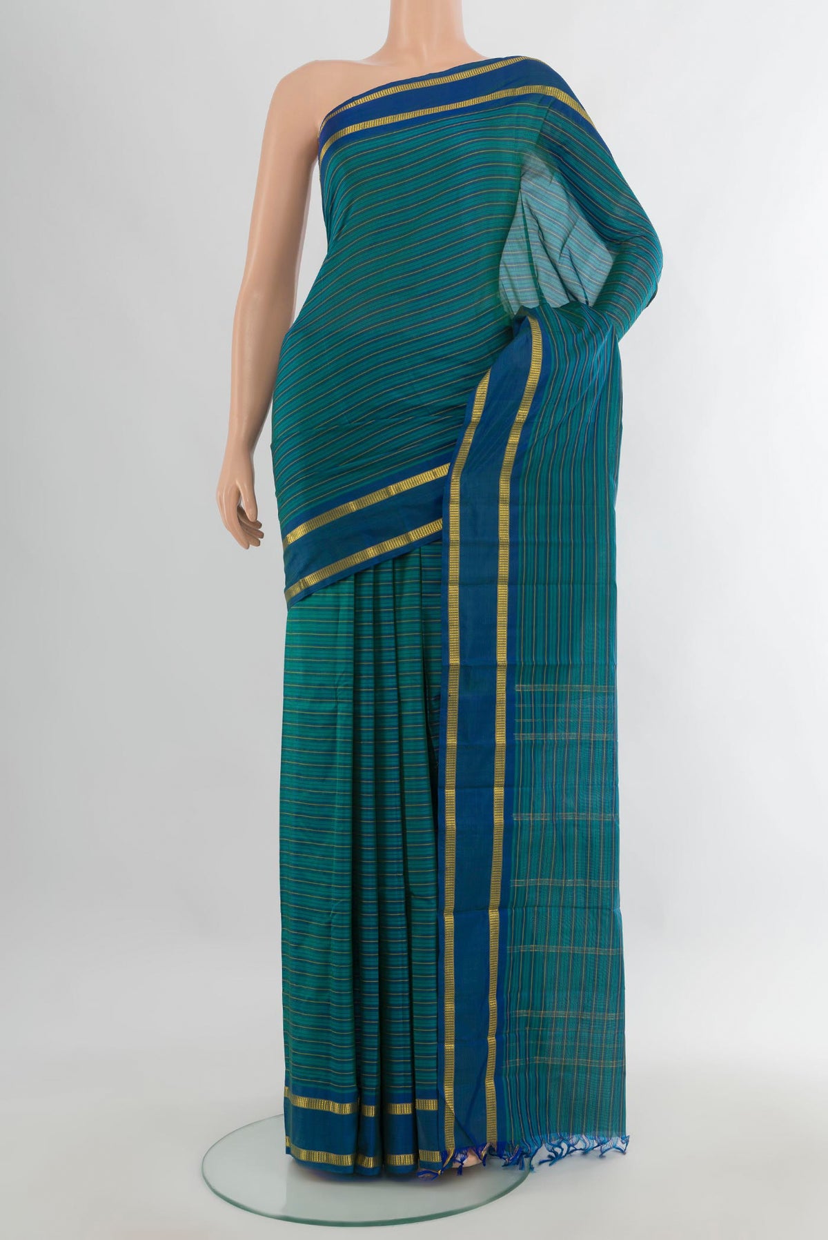 Pure Silk Sea Green Kanchipuram Saree with Stripes on the body and Zari Border.  displayed on a mannequin