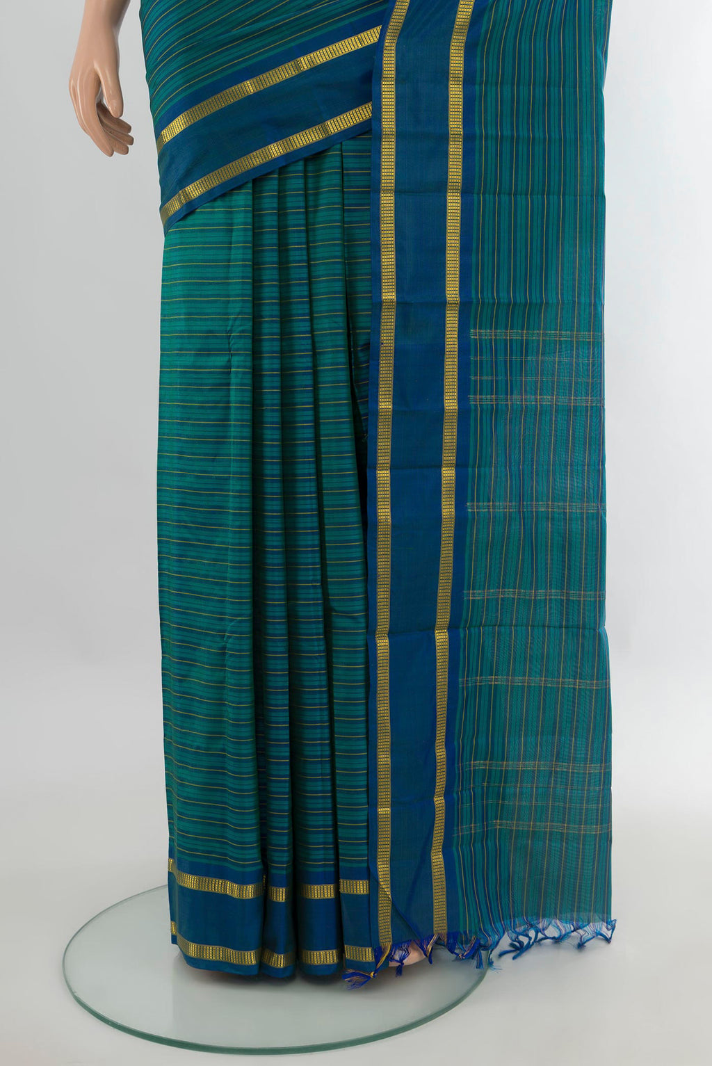 Pleats and pallu of Pure Silk Sea Green Kanchipuram Saree with Stripes on the body and Zari Border. 