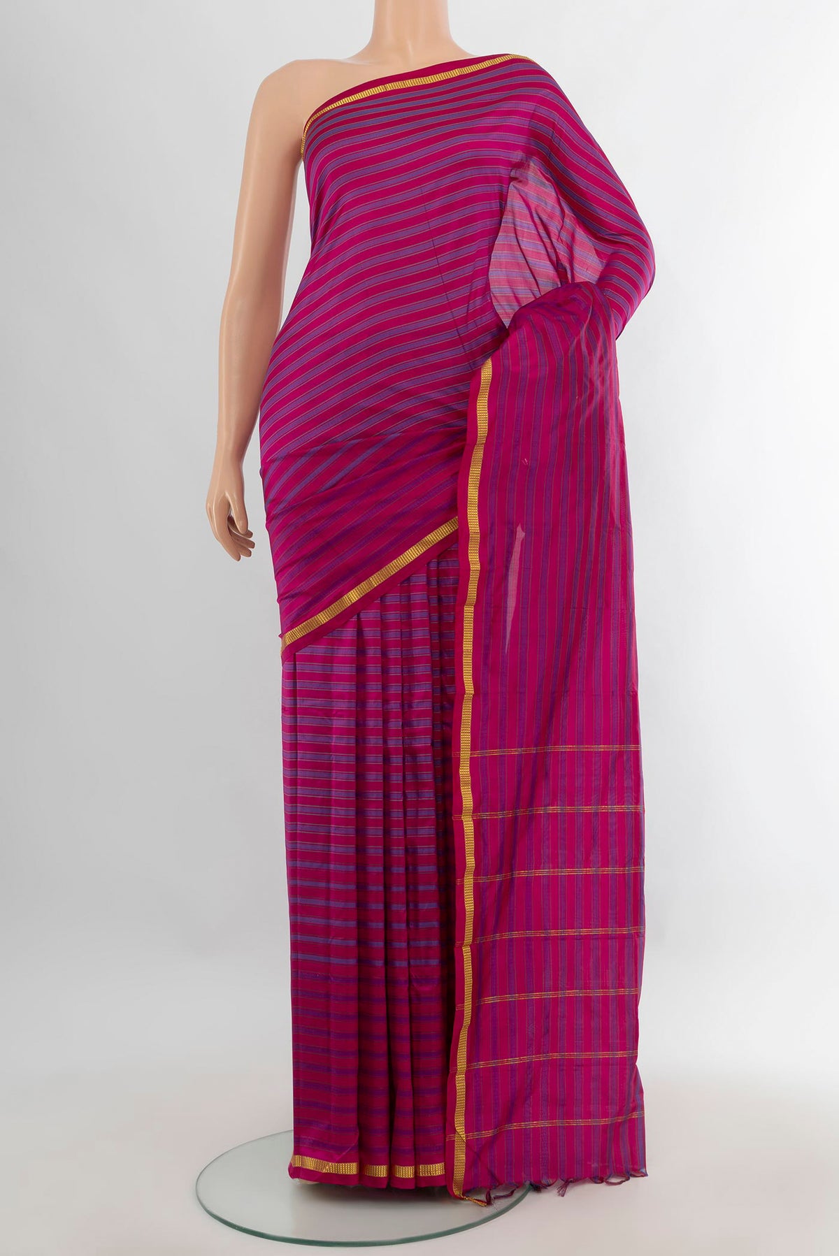 Pure Silk Pink Kanchipuram Saree with Stripes on the body and Zari Border.  displayed on a mannequin