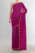 Pure Silk Multi Color Kanchipuram Saree with Checked design on the body and Silk Border.  displayed on a mannequin