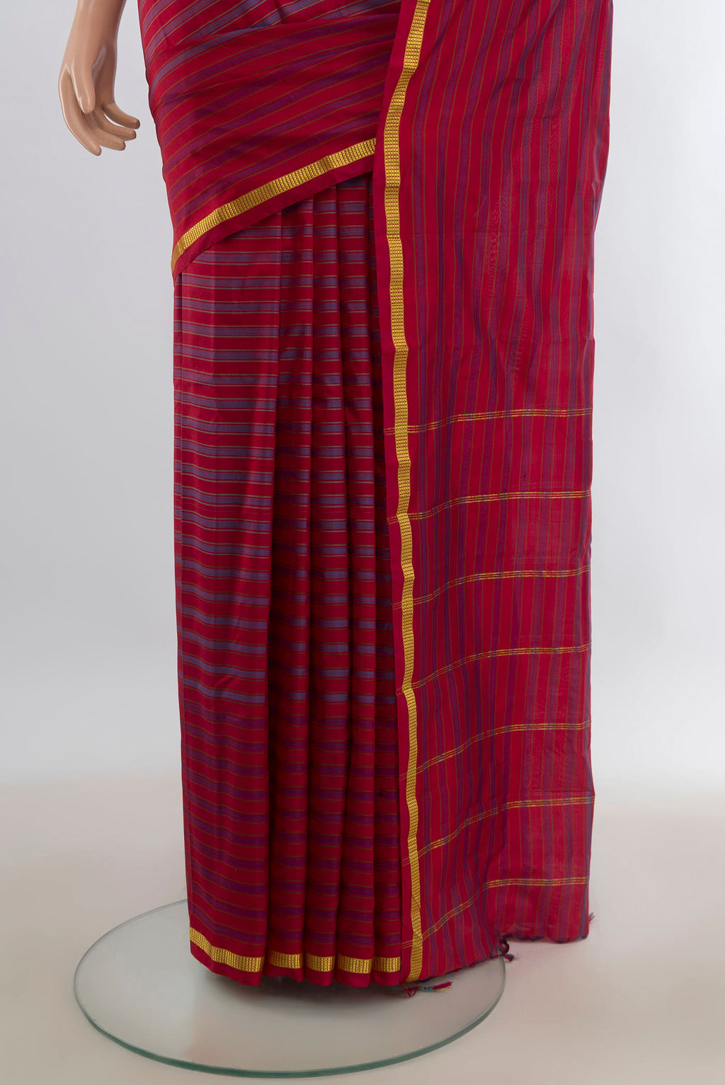Pleats and pallu of Pure Silk Multi Color Kanchipuram Saree with Stripes on the body and Zari Border. 
