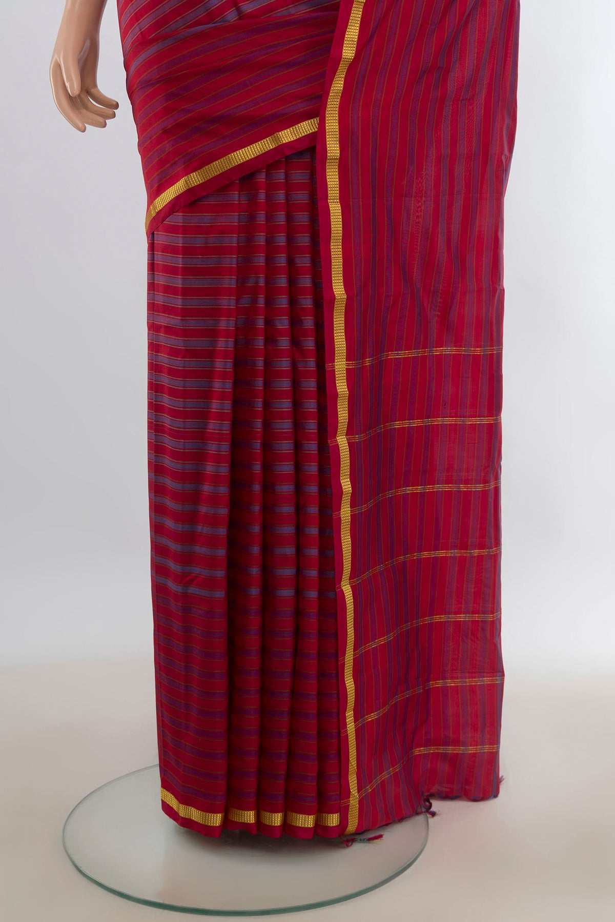 Pleats and pallu of Pure Silk Multi Color Kanchipuram Saree with Stripes on the body and Zari Border. 
