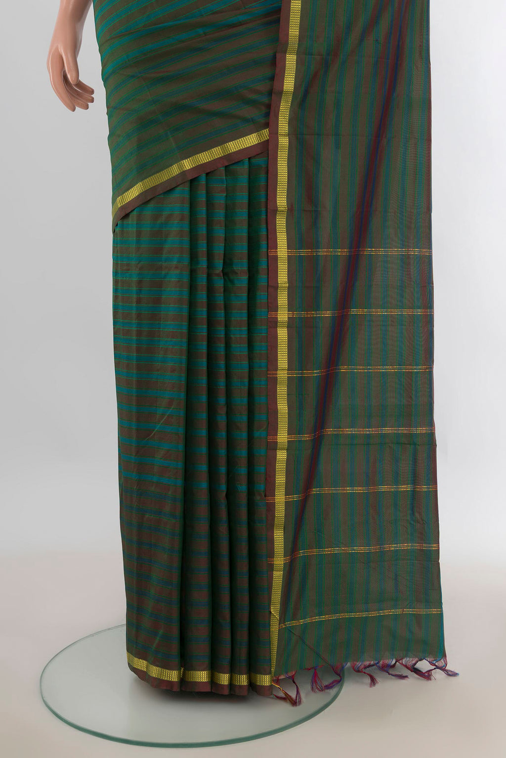 Pleats and pallu of Pure Silk Multi Color Kanchipuram Saree with Checked design on the body and Silk Border. 