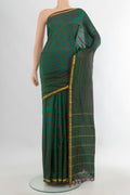 Pure Silk Green Kanchipuram Saree with Stripes on the body and Zari Border.  displayed on a mannequin