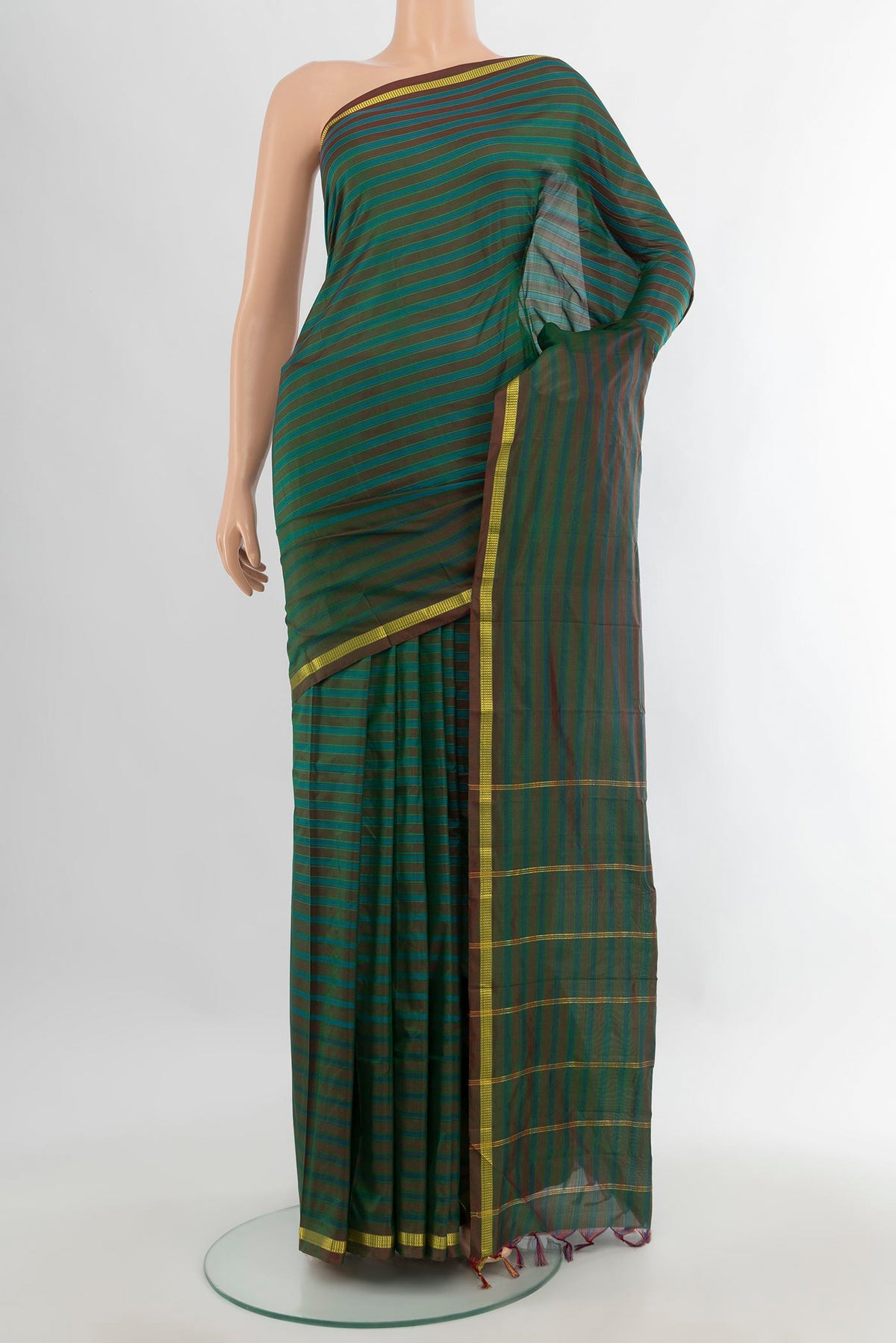 Pure Silk Green Kanchipuram Saree with Stripes on the body and Zari Border.  displayed on a mannequin