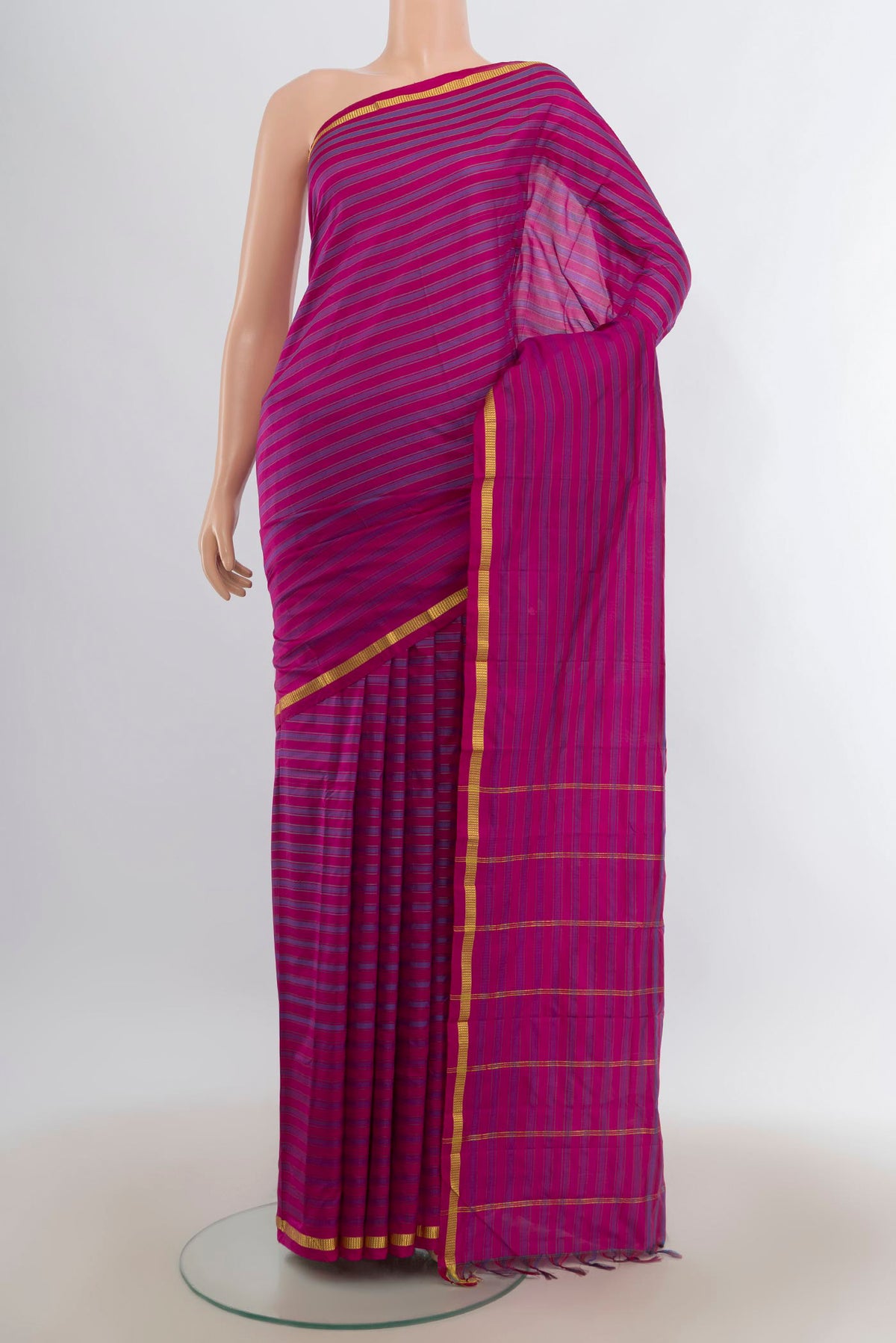 Pure Silk Magenta Kanchipuram Saree with Stripes on the body and Zari Border.  displayed on a mannequin