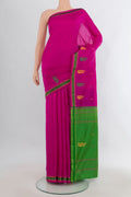 Pure Silk Rani Pink Kanchipuram Saree with Plain Body and Thread Border.  displayed on a mannequin
