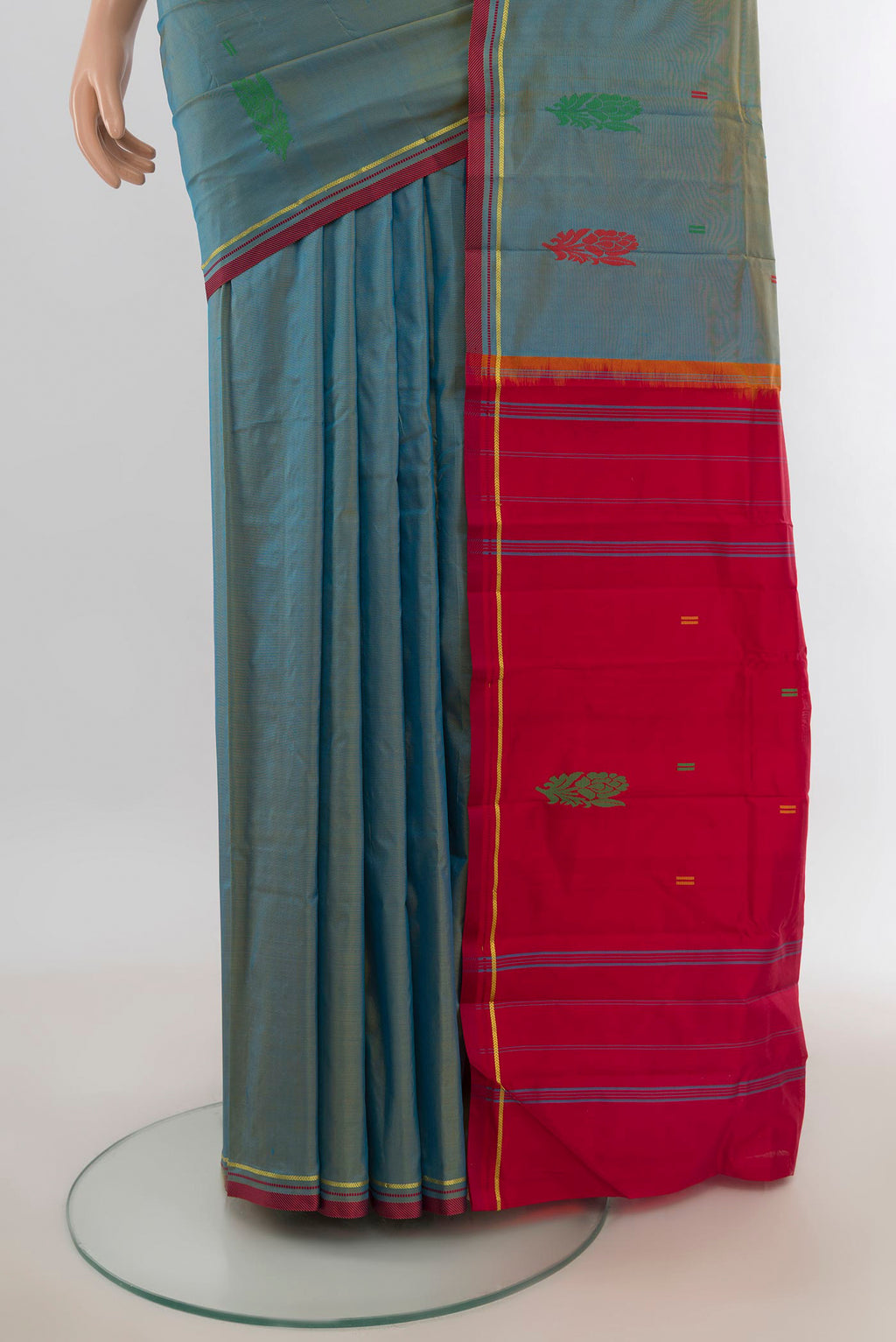 Pleats and pallu of Pure Silk Light Blue Kanchipuram Saree with Thread Butta on the body and Silk Border. 
