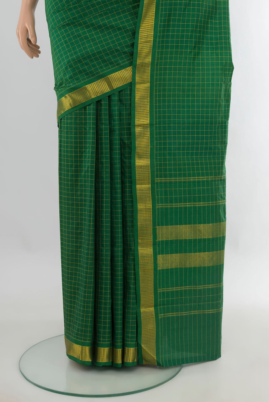 Pleats and pallu of Pure Silk Green Kanjivaram Saree with Checked design on the body and Zari Border. 