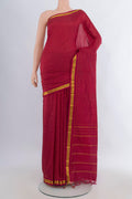 Pure Silk Maroon Kanjivaram Saree with Checked design on the body and Zari Border.  displayed on a mannequin