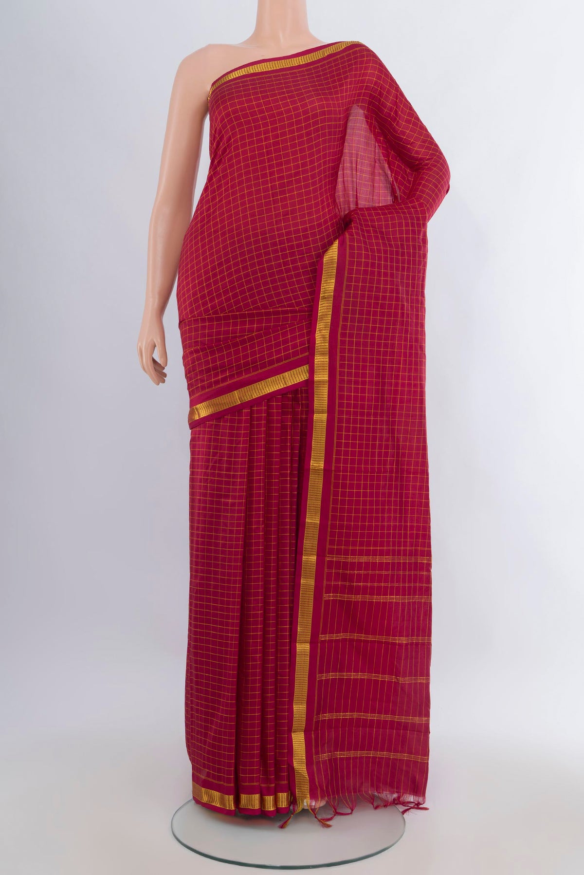 Pure Silk Maroon Kanjivaram Saree with Checked design on the body and Zari Border.  displayed on a mannequin