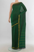 Pure Silk Mint Green Kanjivaram Saree with Checked design on the body and Silk Border.  displayed on a mannequin