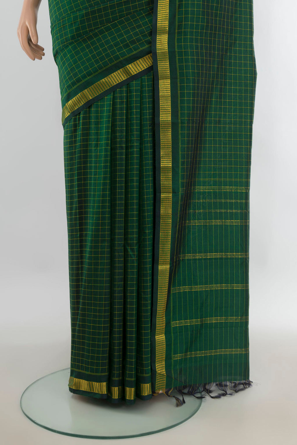 Pleats and pallu of Pure Silk Mint Green Kanjivaram Saree with Checked design on the body and Silk Border. 