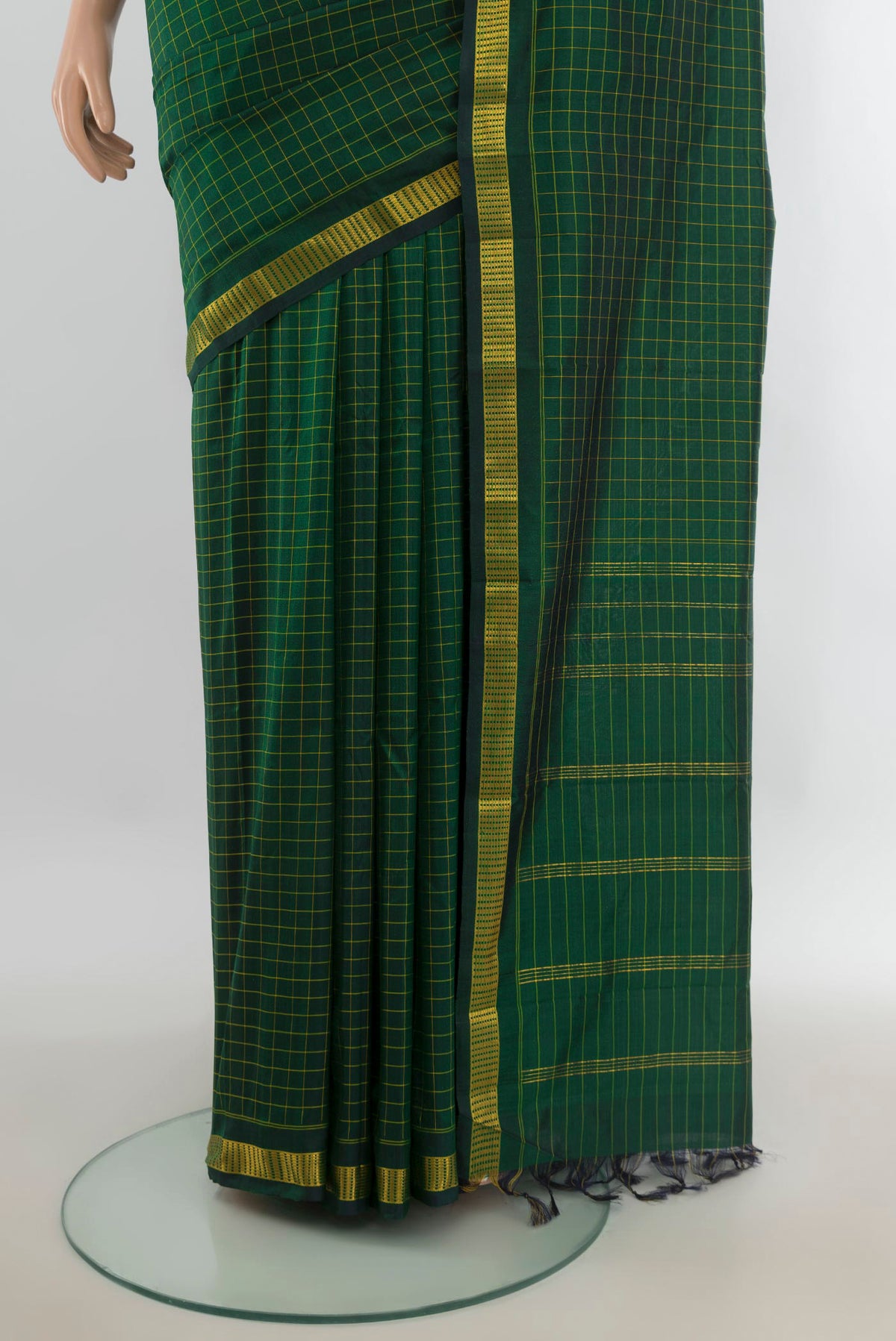 Pleats and pallu of Pure Silk Mint Green Kanjivaram Saree with Checked design on the body and Silk Border. 