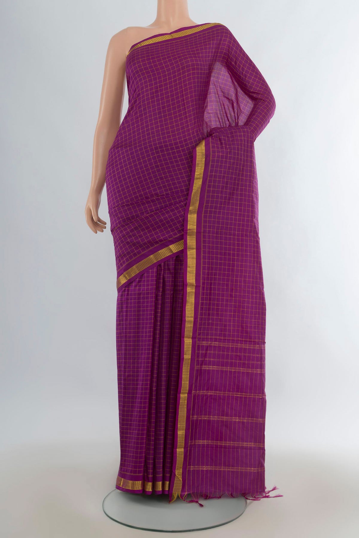 Pure Silk Purple Kanjivaram Saree with Checked design on the body and Zari Border.  displayed on a mannequin