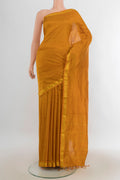 Pure Silk Mustard Kanjivaram Saree with Checked design on the body and Silk Border.  displayed on a mannequin
