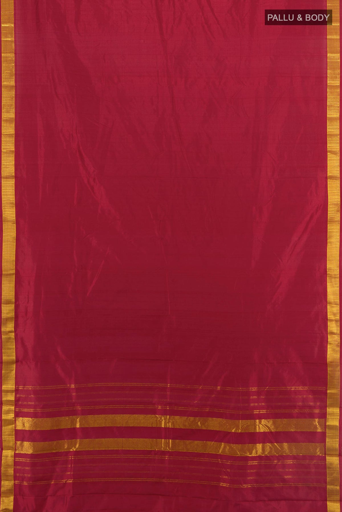 Flat view of Pure Silk Maroon Kanjivaram Saree with Plain Body and Silk Border. 