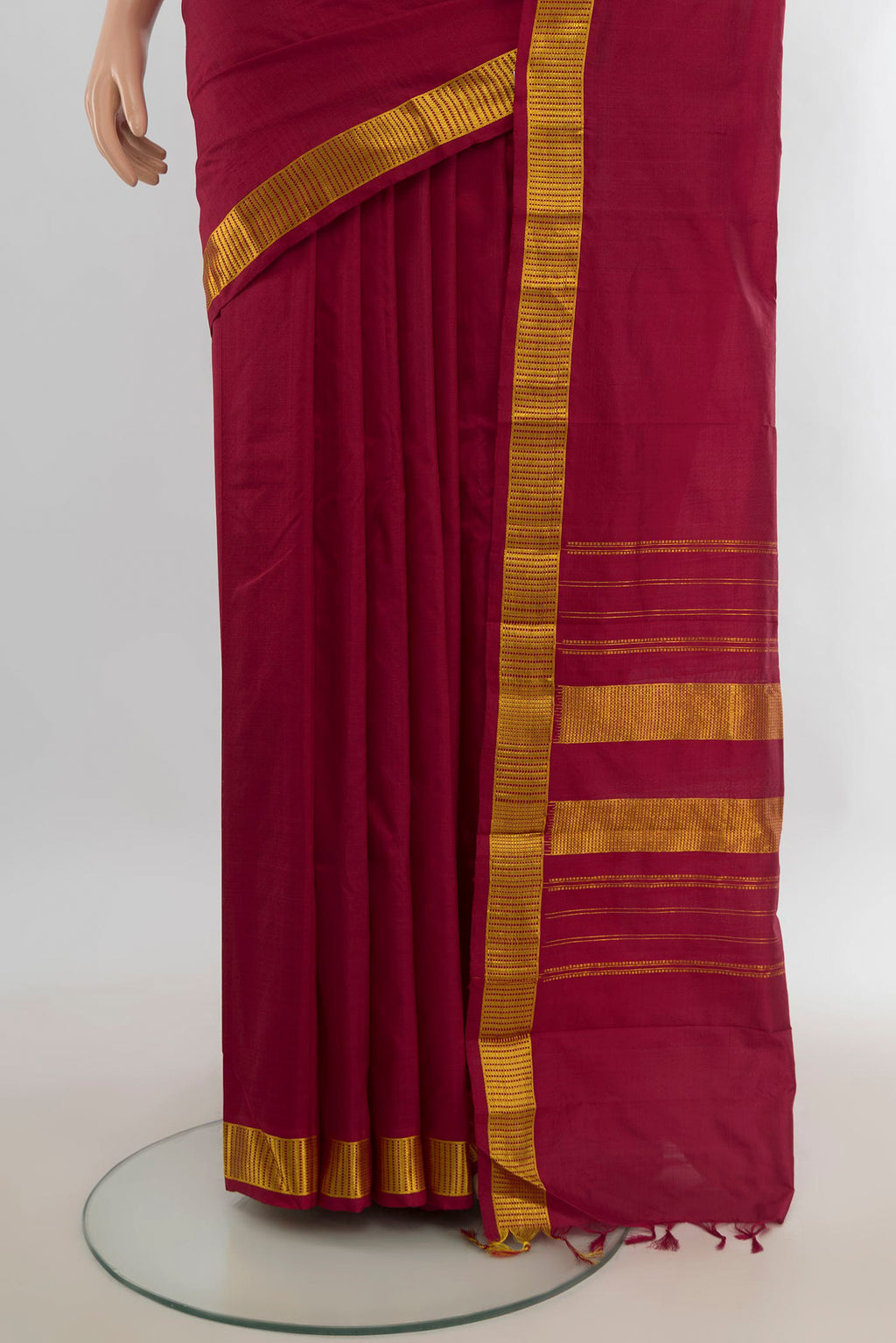Pleats and pallu of Pure Silk Maroon Kanjivaram Saree with Plain Body and Silk Border. 
