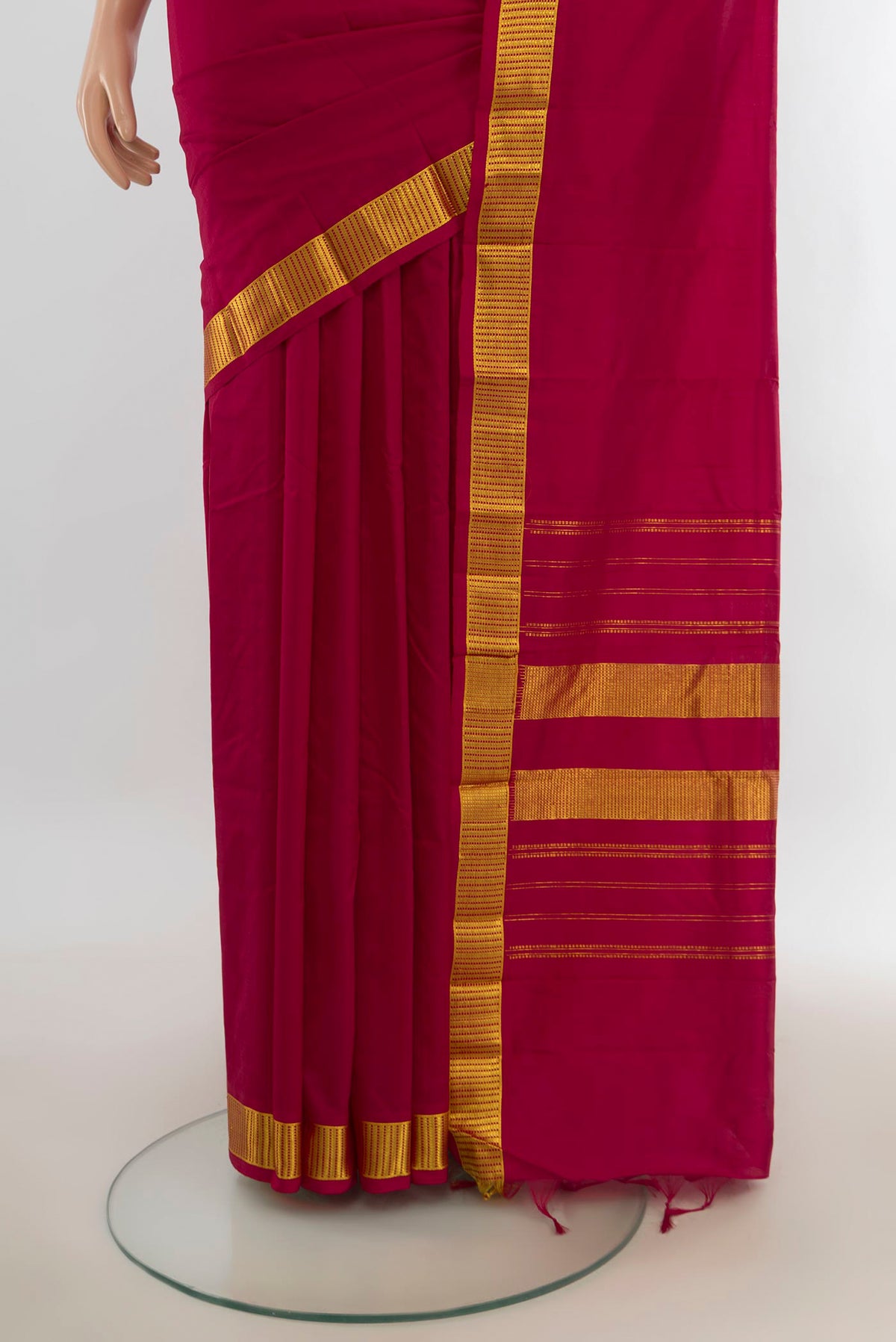 Pleats and pallu of Pure Silk Maroon Kanjivaram Saree with Plain Body and Silk Border. 