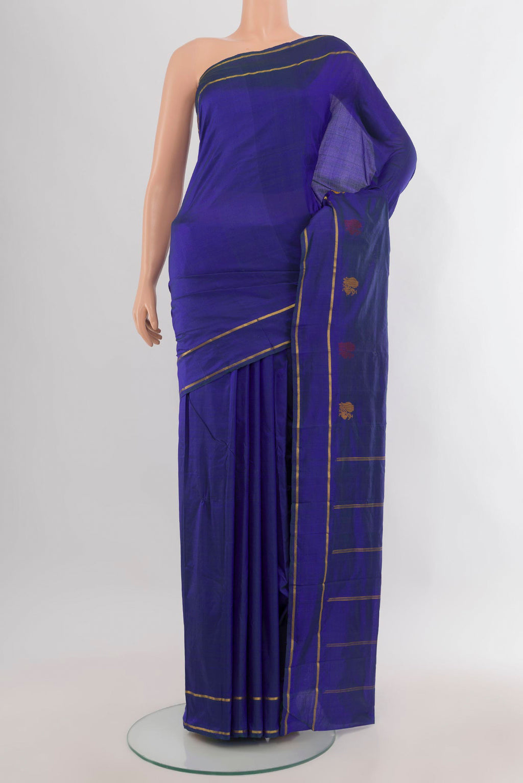 Pure Silk Blue Kanjivaram Saree with Plain Body and Zari Border.  displayed on a mannequin