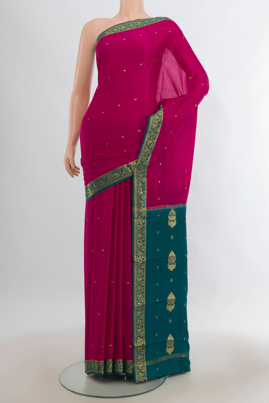 Dark Pink Mysore Crepe Saree with Zari Butta on the body and Zari Border.  displayed on a mannequin