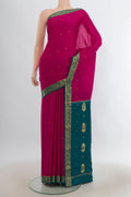 Dark Pink Mysore Crepe Saree with Zari Butta on the body and Zari Border.  displayed on a mannequin
