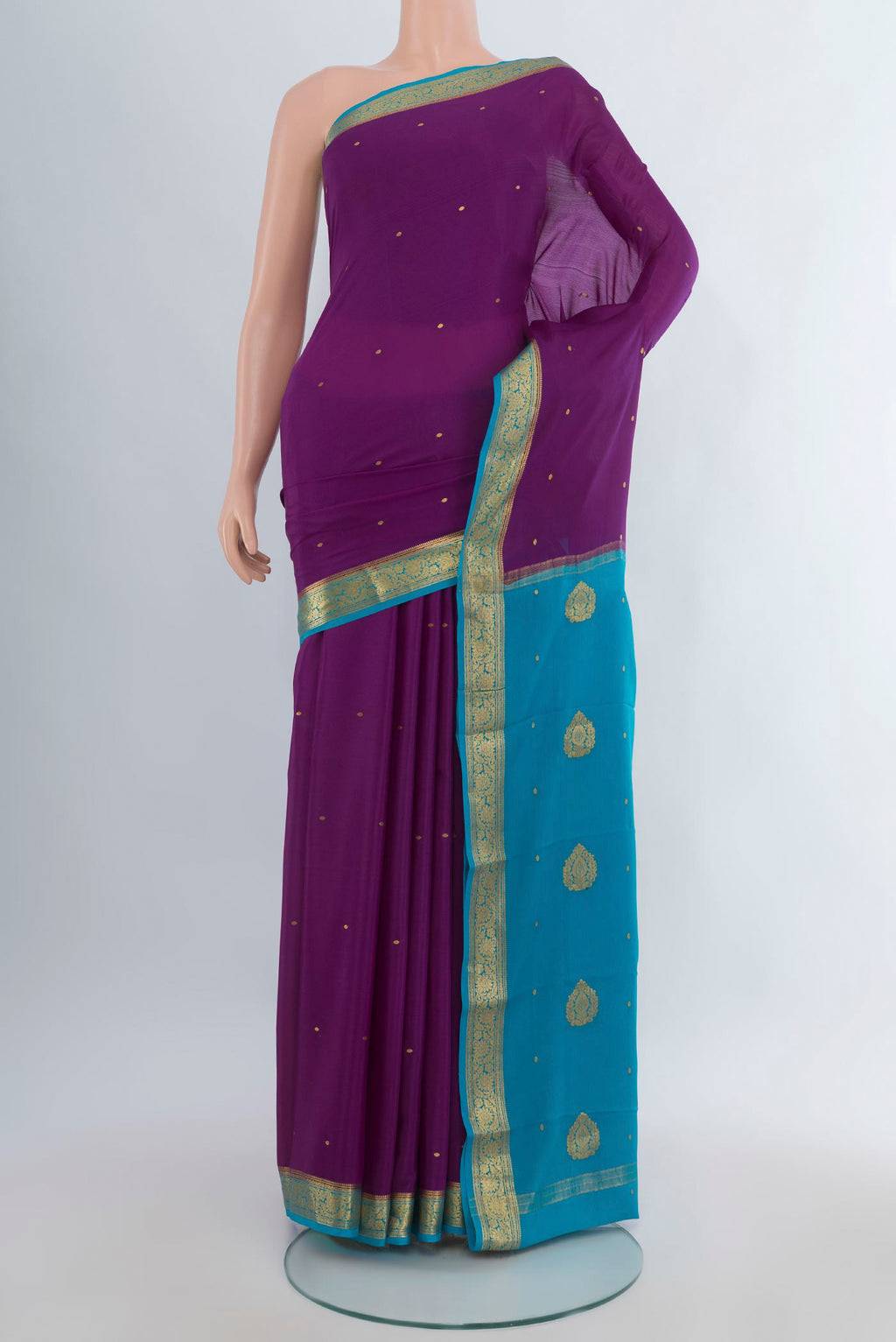 Purple Mysore Crepe Saree with Zari Butta on the body and Zari Border.  displayed on a mannequin