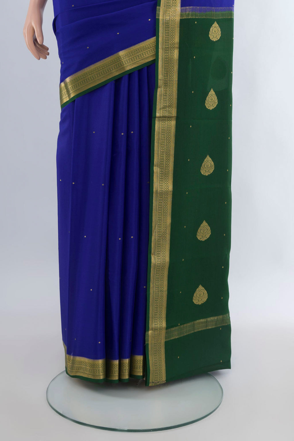 Pleats and pallu of Royal Blue Mysore Crepe Saree with Zari Butta on the body and Zari Border. 