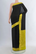 Black Mysore Crepe Saree with Zari Butta on the body and Zari Border.  displayed on a mannequin