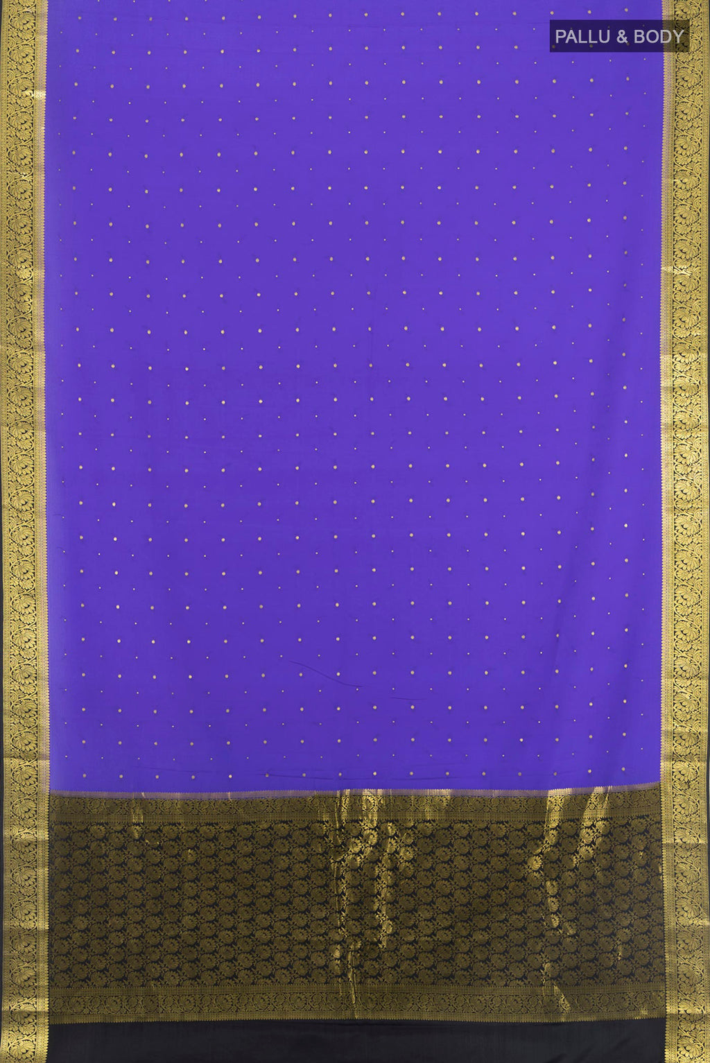 Flat view of Lavender Mysore Crepe Saree with Zari Butta on the body and Zari Border. 