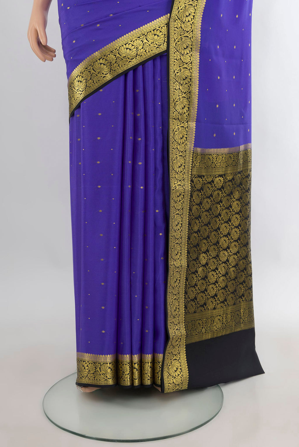 Pleats and pallu of Lavender Mysore Crepe Saree with Zari Butta on the body and Zari Border. 