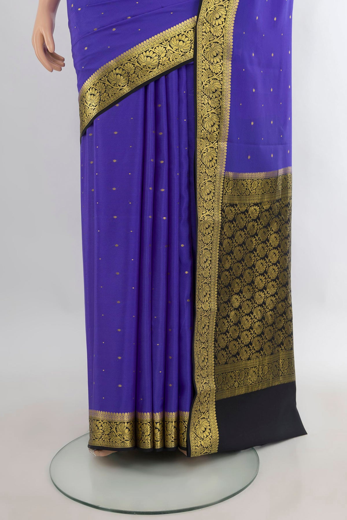 Pleats and pallu of Lavender Mysore Crepe Saree with Zari Butta on the body and Zari Border. 